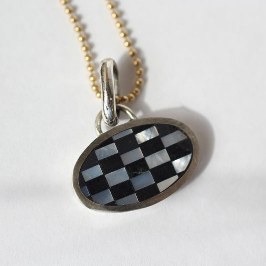 Sterling Checker Charm No. 83